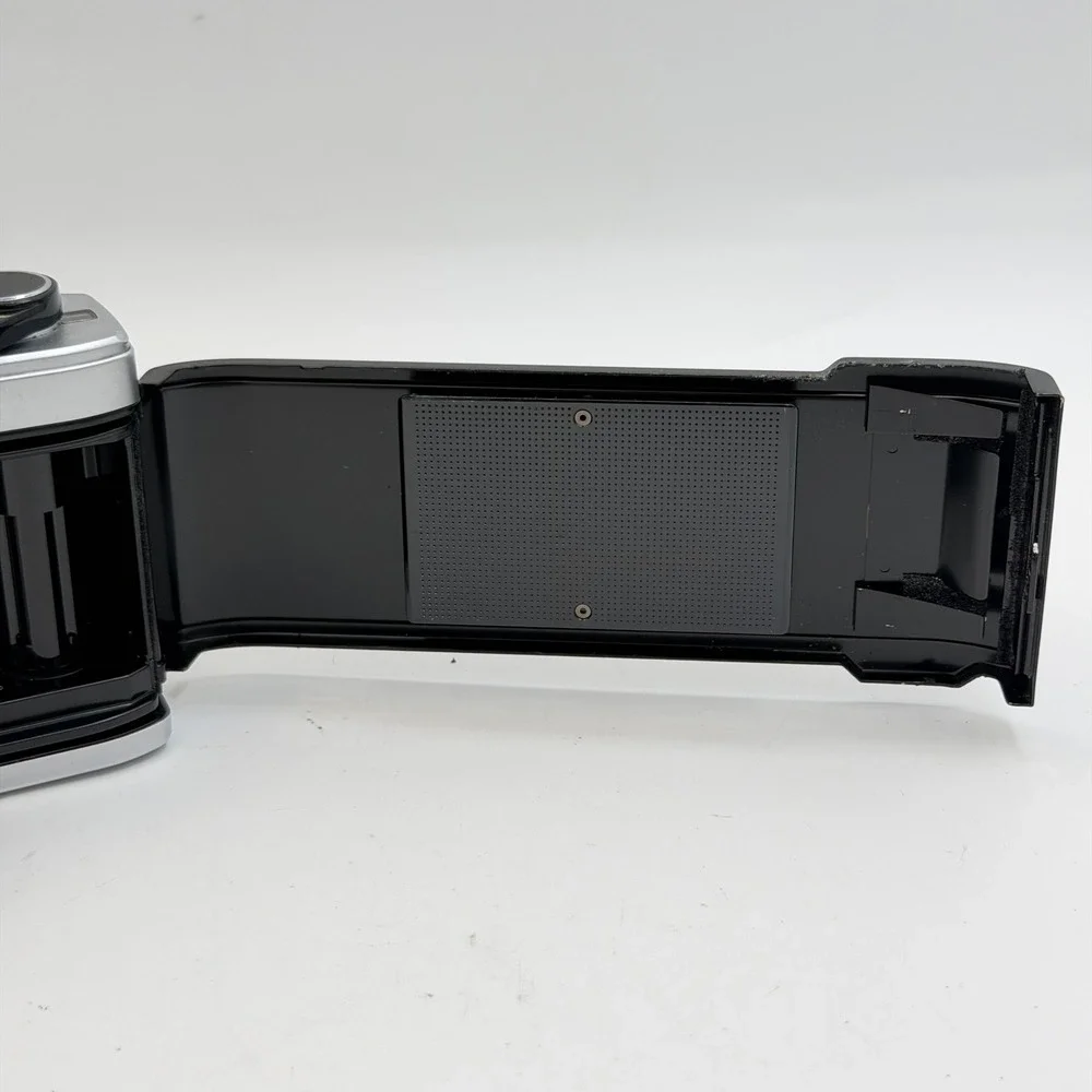 Olympus OM10 35mm Film SLR Camera with Zuiko Auto-S 50mm f1.8 Lens Silver Black